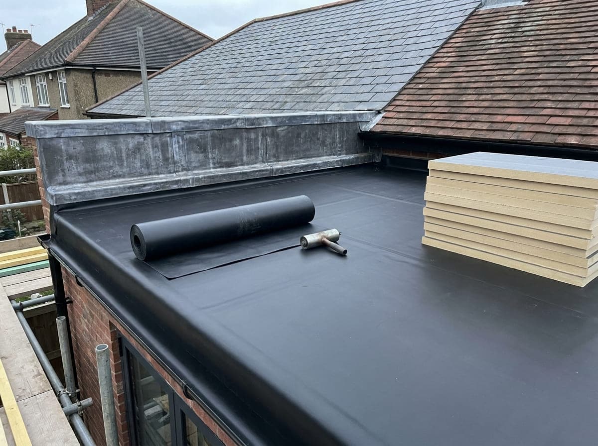 A completed warm deck flat roof on a domestic extension with a single piece EPDM rubber membrane